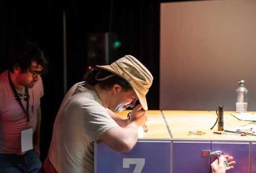 A player solving The Cube's puzzles during the finals