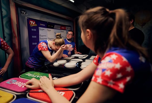 A team is thinking hard during the championship, and one player is feeling tired or stressed.