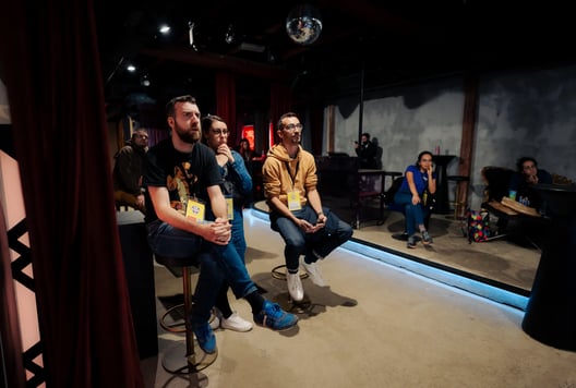 The audience is watching the event.