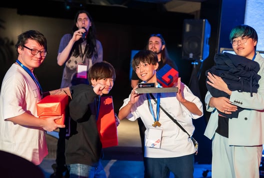 Winning group with prizes, enjoying their win